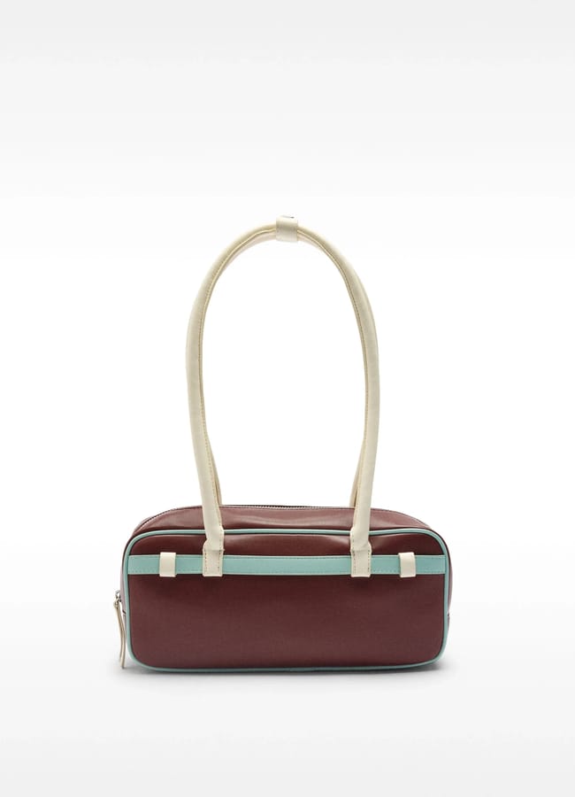 brown and blue bowling bag