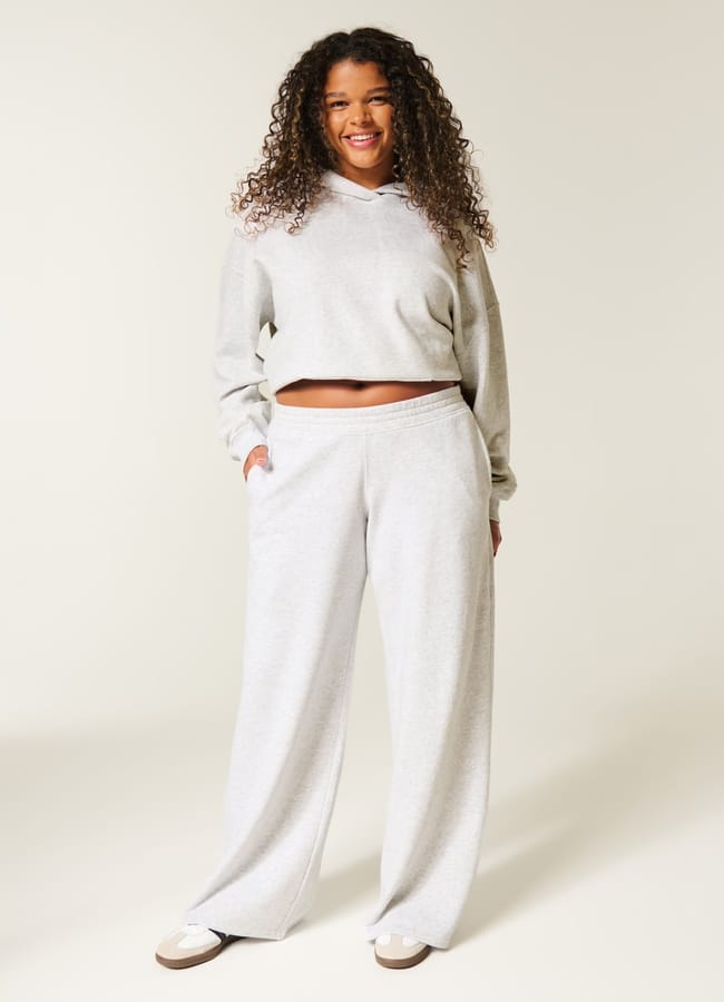 model wearing sweat pants and jumper