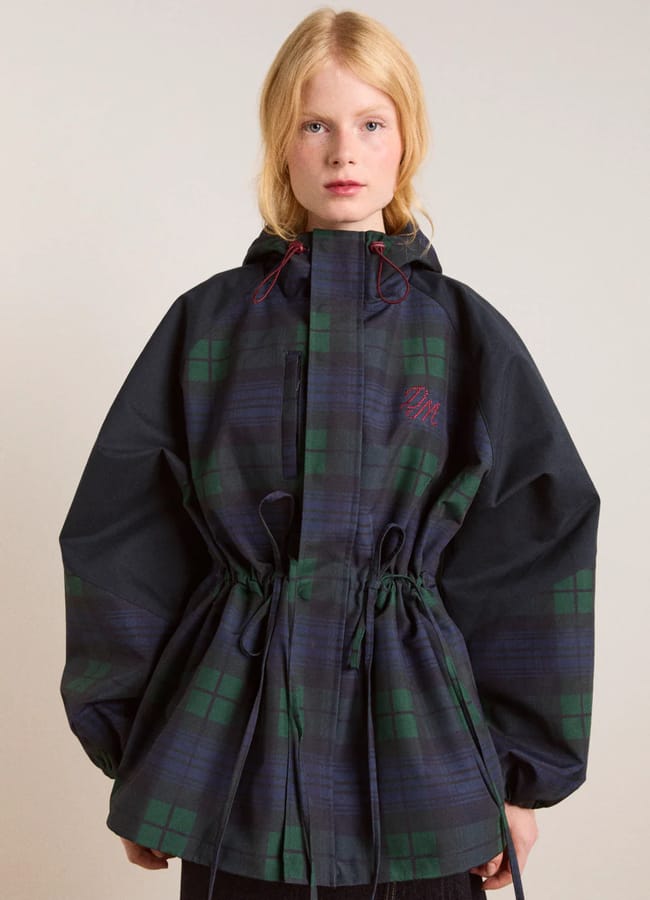 model wearing Dm pre-order liu shower resistant raincoat - navy check