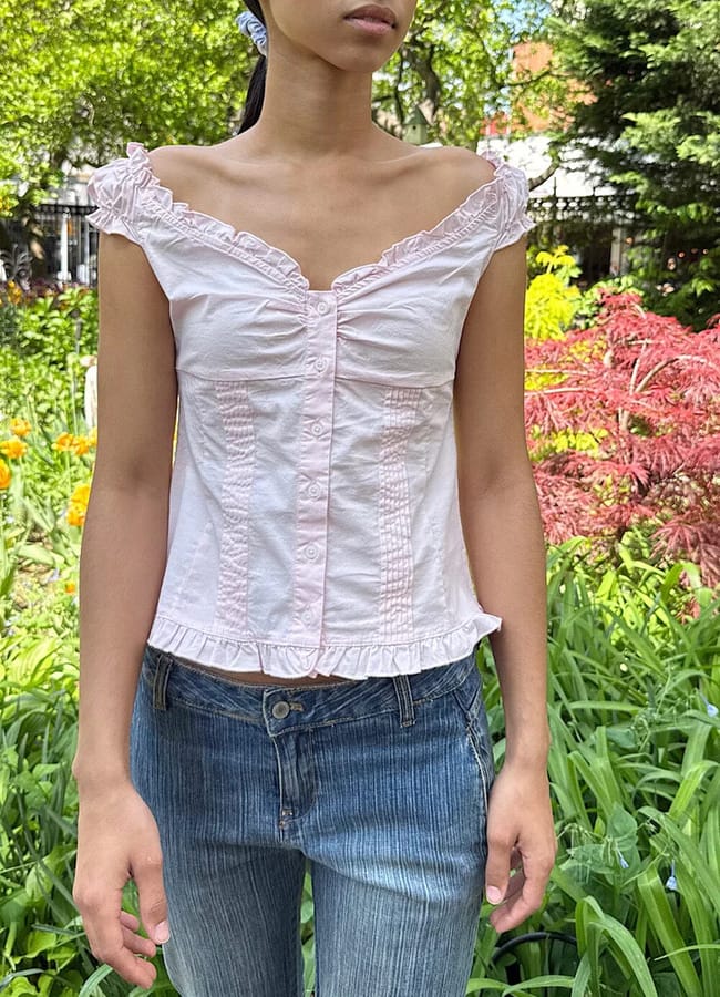 girl wearing pink top