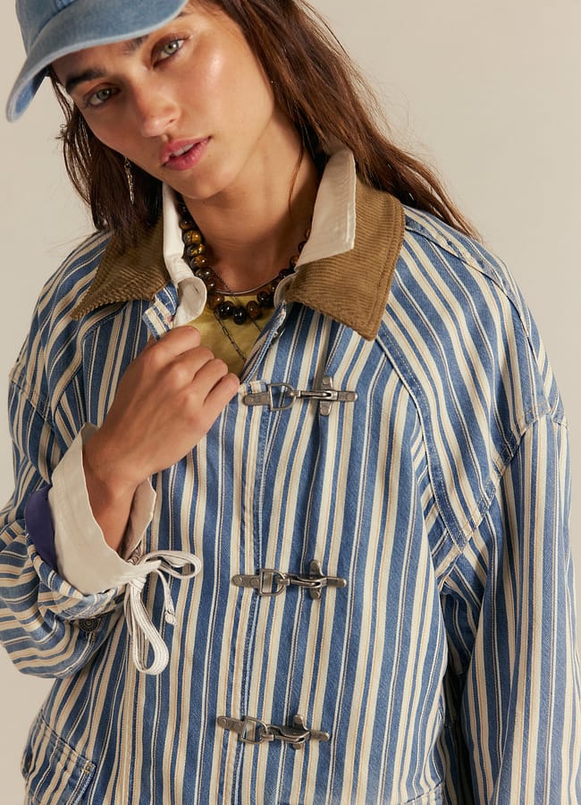model wearing Fp We The Free Striped Denim Barn Coat