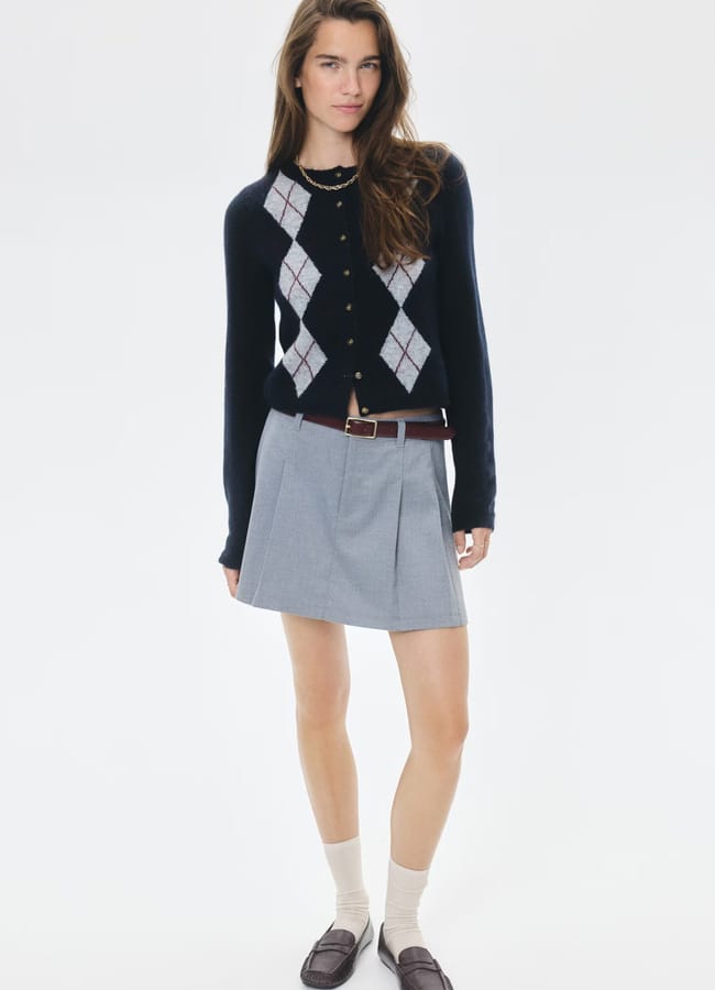 model wearing H&M Jacquard-knit cardigan and mini skirt