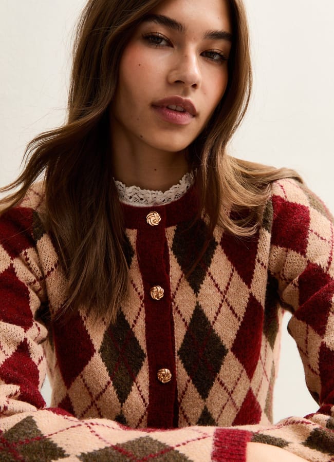 female model wearing New Look Red Argyle Long Sleeve Knit Cardigan