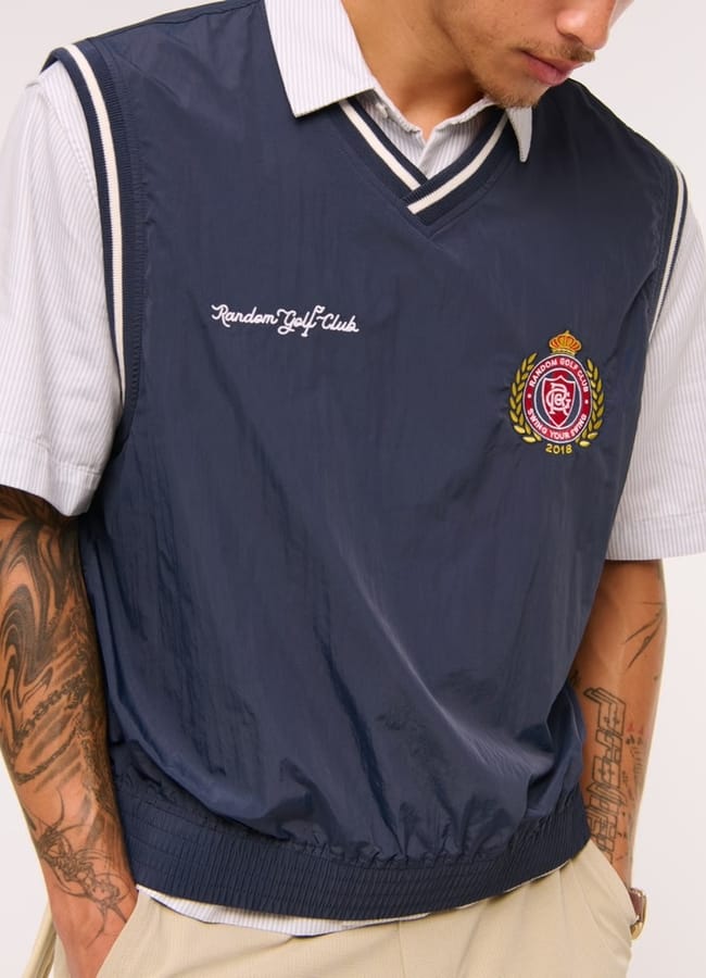 male model wearing Random Golf Club Nylon Vest
