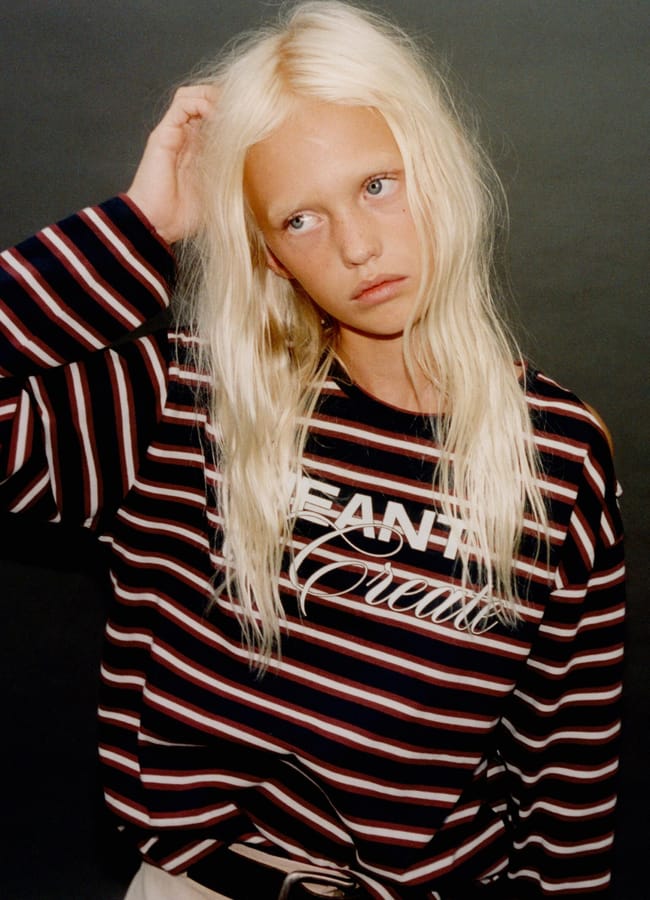 girl wearing STRIPED T-SHIRT WITH CUT-OUT