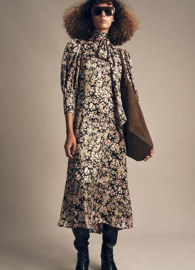 model wearing floral midi dress