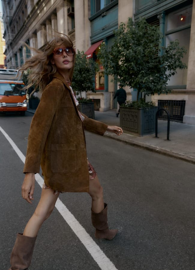 model in street wearing zara 100% LEATHER LONG JACKET