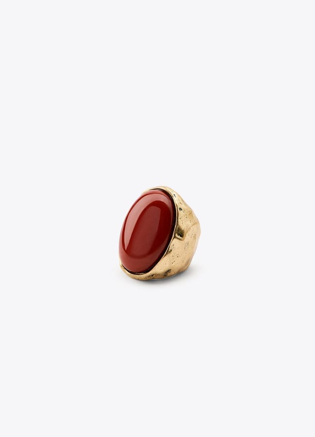 red and gold stone ring