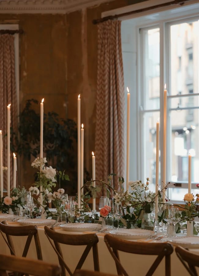 Ivory Tapered Candles on dining table