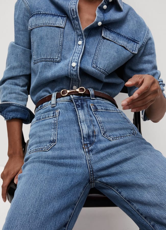 model wearing M&S Patch Pocket Flare High Waisted Jeans