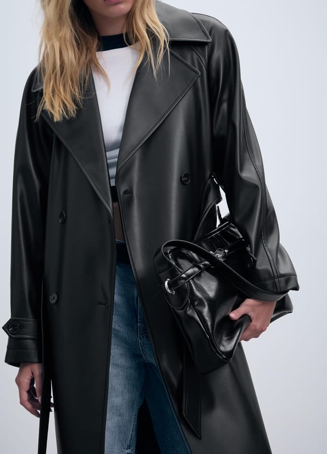 model close up wearing strad Long faux leather trench coat