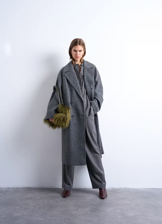 model wearing Topshop clean double breasted longline coat in charcoal
