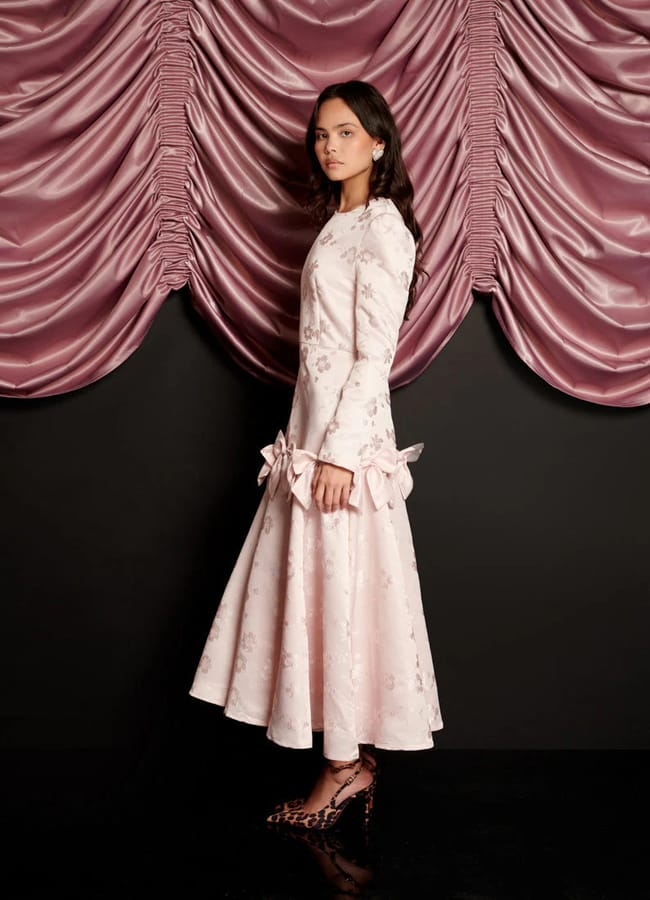 model wearing Gloss Jacquard Midi Dress in pale pink