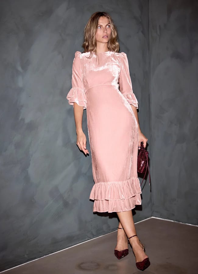 model wearing Pink Velvet Ruffle Midi Dress