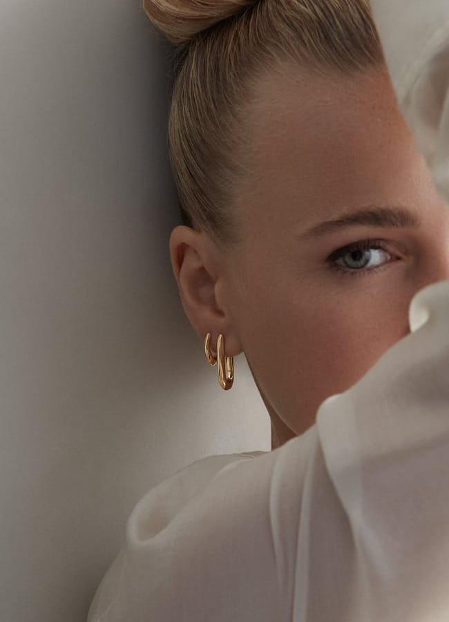 model wearing Thalassa Click Hoops