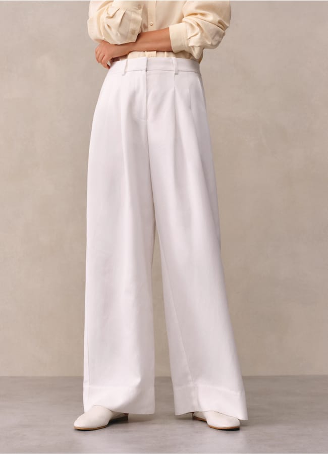 white wide leg trousers on model