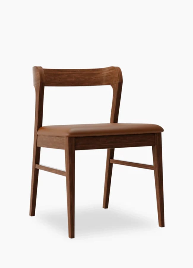 A wooden dining chair with a curved backrest and a brown upholstered seat, perfect for adding ski chalet charm to your cosy home décor. Shown on a plain white background.
