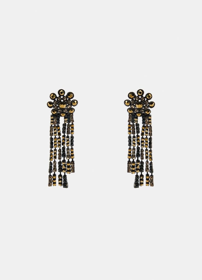 A pair of ornate gold and black beaded chandelier earrings with floral stud tops and five dangling strands each, perfect for elevating any fashion ensemble or pairing with brown trousers for a chicer look, displayed against a plain white background.