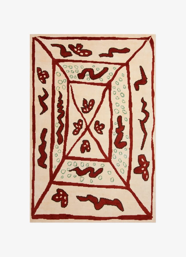 A rectangular rug with a cream background, decorated with abstract red shapes inspired by the Unexpected Red Theory, wavy lines, and scattered light green dots forming a frame and cross pattern in the centre—perfect for modern interior design.