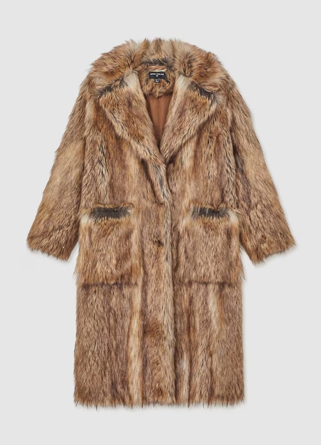 A long, brown faux fur coat with a plush texture, wide lapels, and large front pockets—perfect for layering over chic outfits with tights—displayed flat on a white background.
