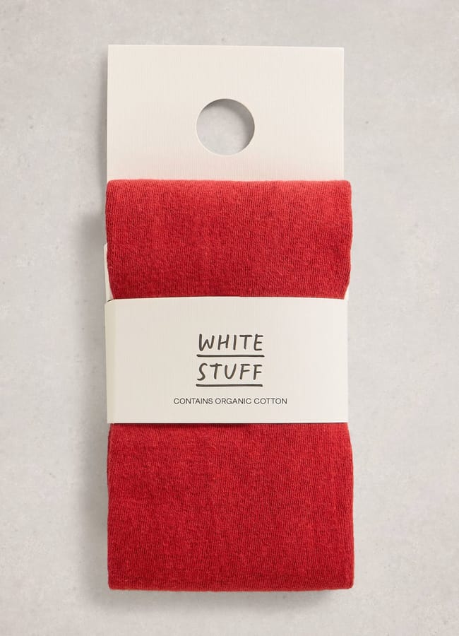 packed of red tights by The White Stuff