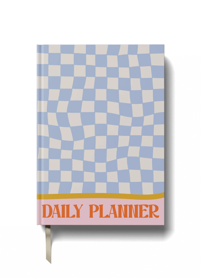 A daily planner with a blue and white chequered cover design and DAILY PLANNER written in bold orange letters on a pink and orange band at the bottom. Perfect for organising your schedule, this 2026 diary includes a cream-coloured ribbon bookmark.