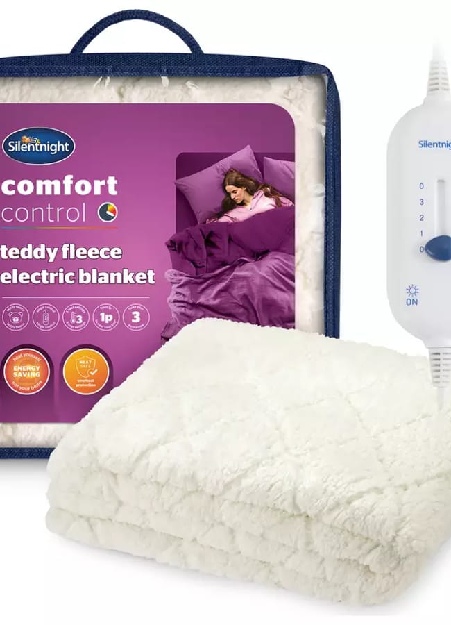 heated blanket A Silentnight teddy fleece electric blanket, considered one of the best heated throws, boasts a white, quilted texture and comes with its packaging and a white control switch for comfort control and heat settings.
