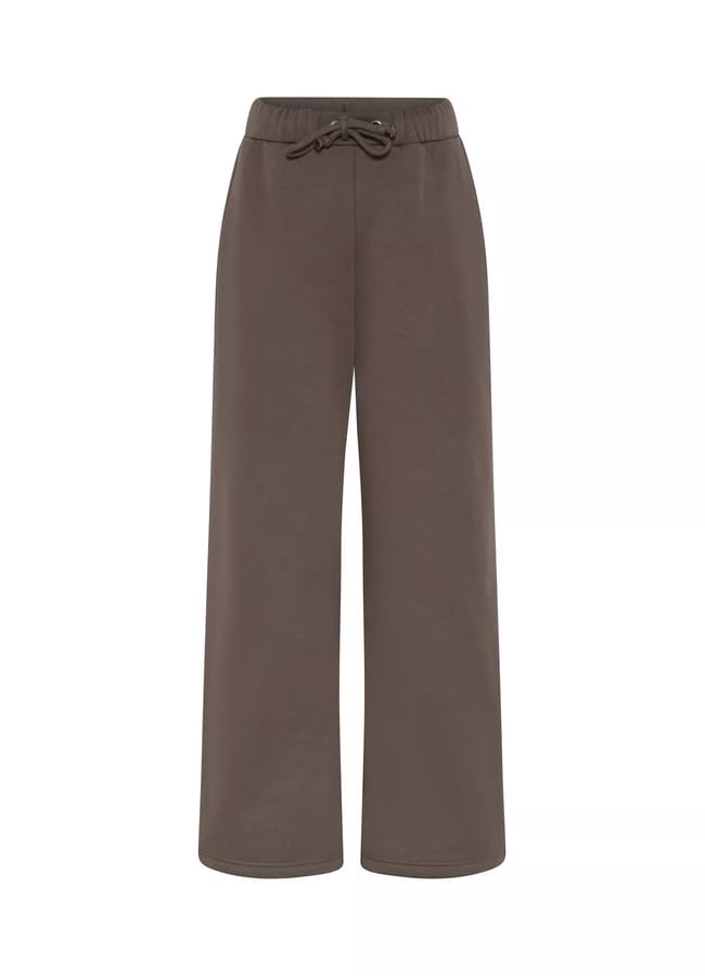 Brown wide-leg athleisure lounge trousers with an elasticated waistband and drawstring, displayed against a white background.