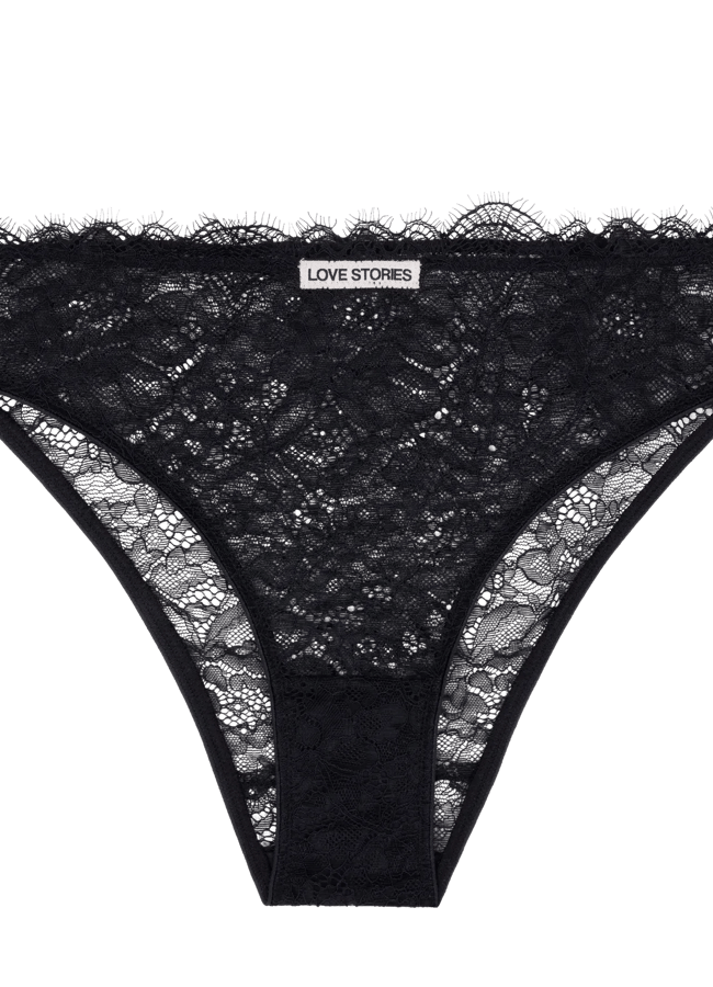 Black lace knickers with a scalloped waistband and a Love Stories label at the centre, perfect for pairing with your favourite lingerie set. The fabric features a delicate floral lace pattern.