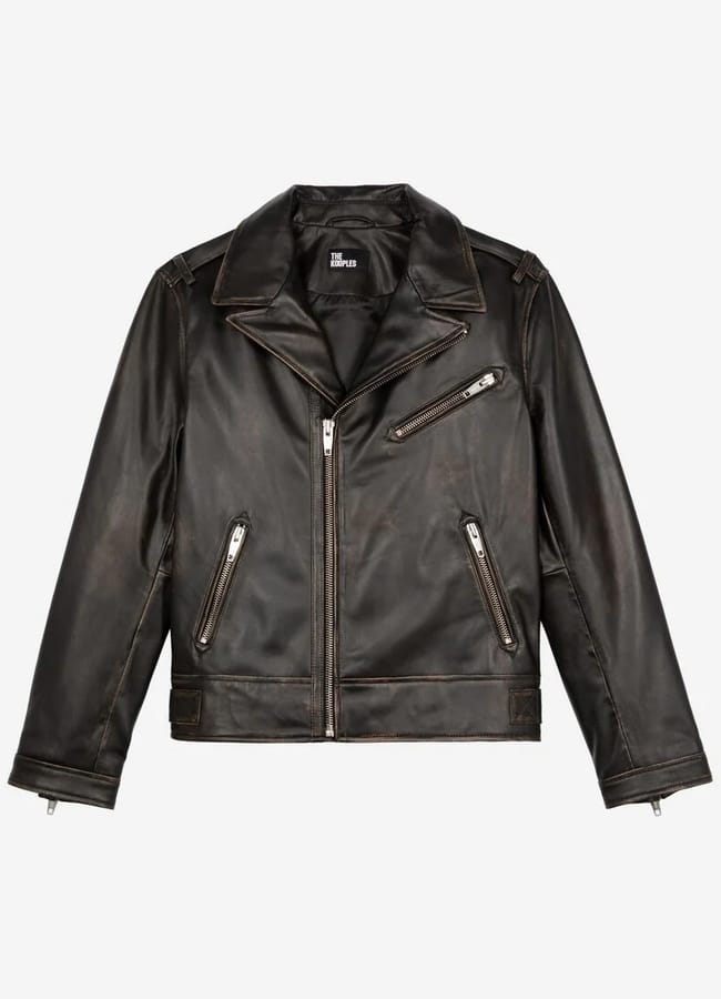 A black leather biker jacket with silver zips, two side pockets, one chest pocket, and a wide collar—perfect for men’s fashion or as part of men’s casual date night outfits. Displayed on a plain white background.