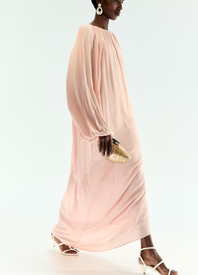 model wearing pink Draped maxi dress