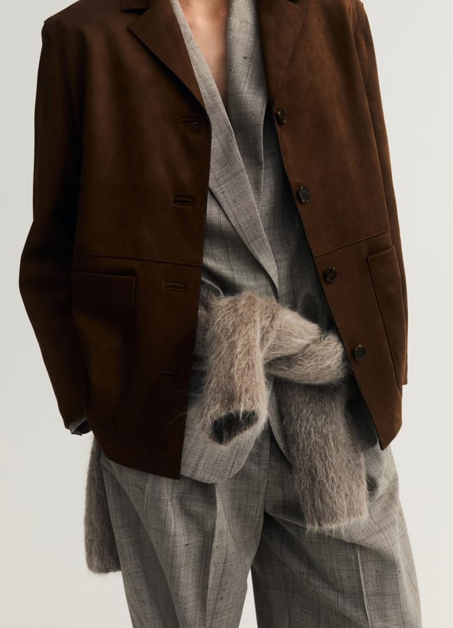 model wearing brown suede look jacket
