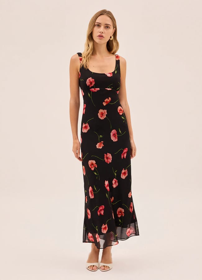 model wearing Kitri Studio Miranda Black Poppy Print Dress