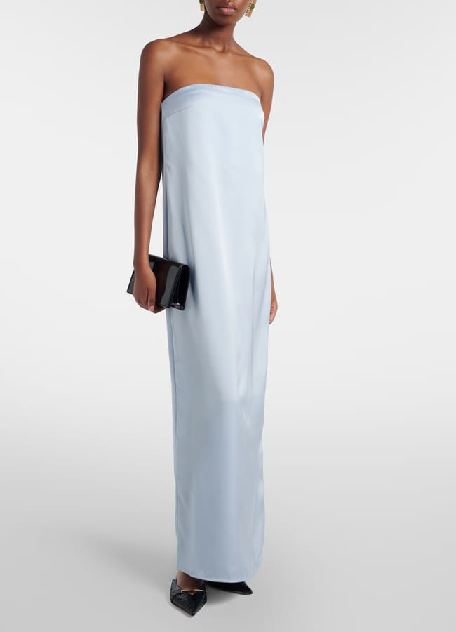 model wearing column bandeau blue satin gown