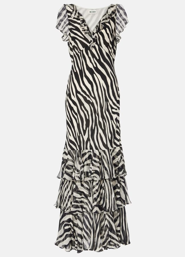 A sleeveless, floor-length zebra print dress featuring a V-neckline, frilled shoulders, and a tiered frill hem.