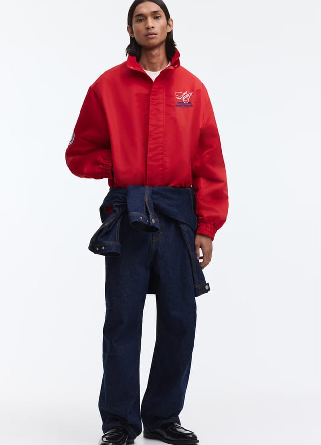 male model wewawring red H&M Loose Fit Embroidered-motif nylon track jacket