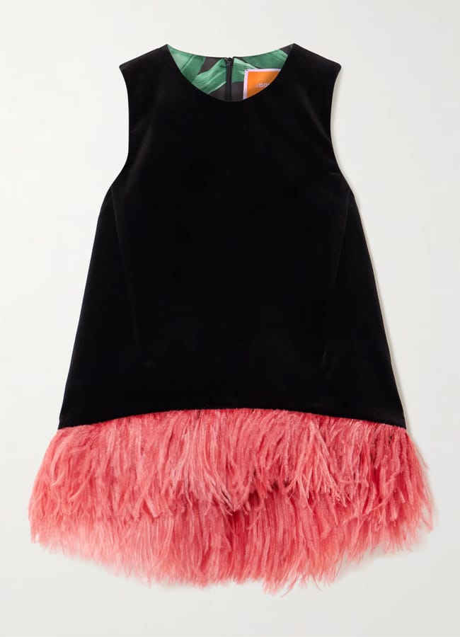 black sleeveless top with pink feather trim