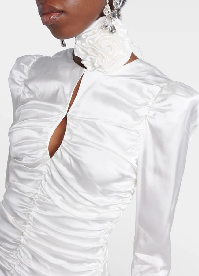 up close of mode's chest wearing Rotate Bridal ruched satin minidress