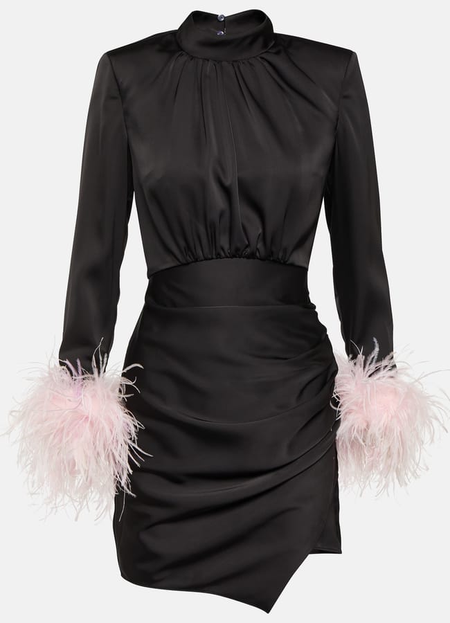 black mini dress with high neck and pink feather cuffs