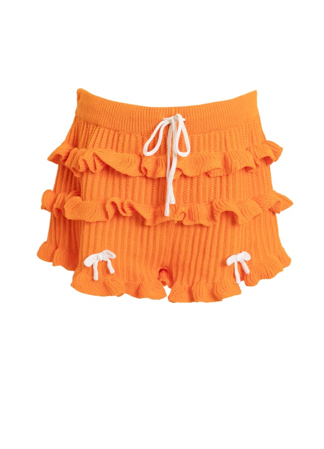 orange frilled shorts