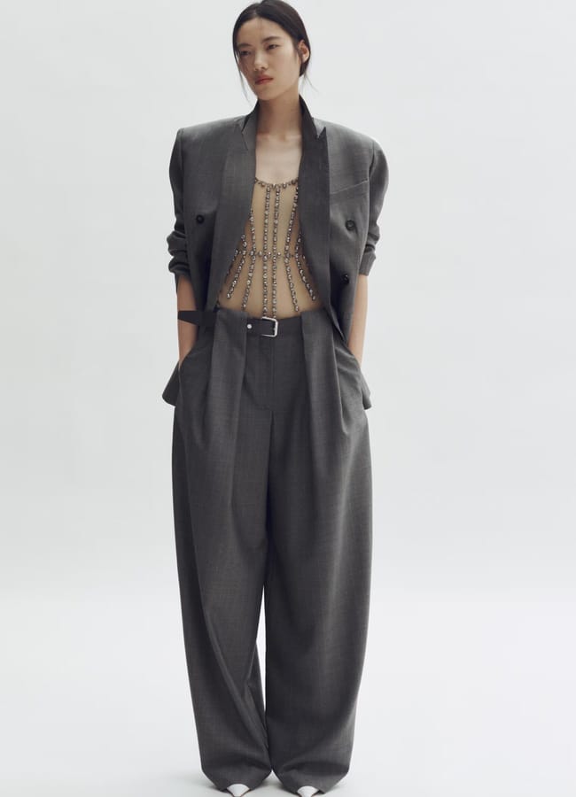 model wearing grey Barrel-Leg Wool Trousers & Blazer