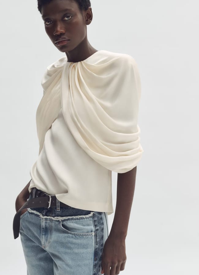 model wears cream / white Draped satin top