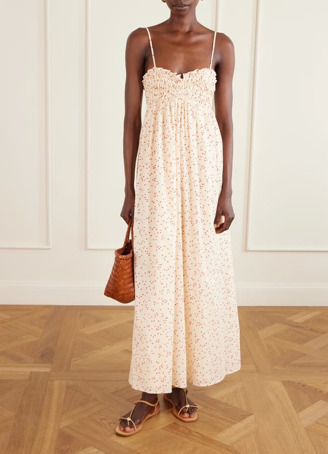 model wearing FAITHFULL Presa shirred ruffled polka-dot cotton-voile maxi dress