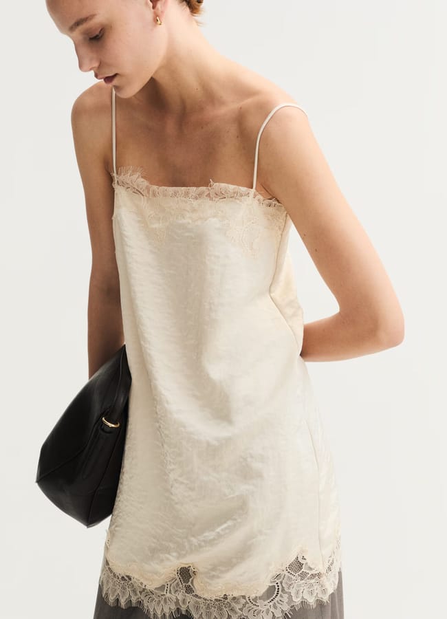 model wearing white H&m Lace-trimmed slip dress