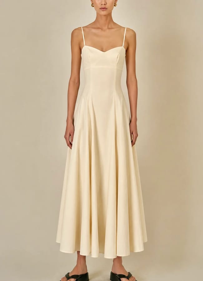 model wearing Marcale London Eloise Cotton Blend Dress Butter Yellow