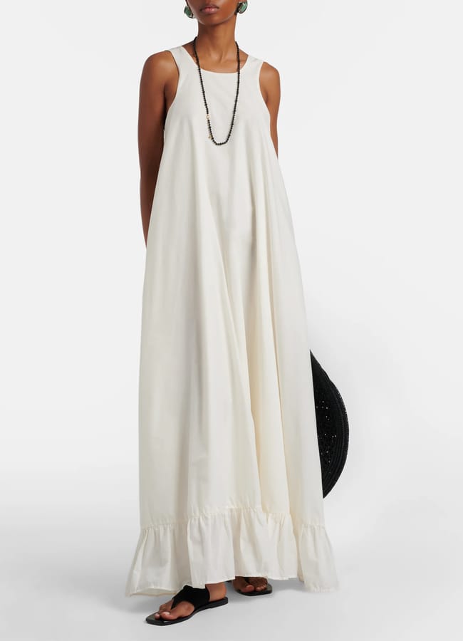 model wearing white billowy dress