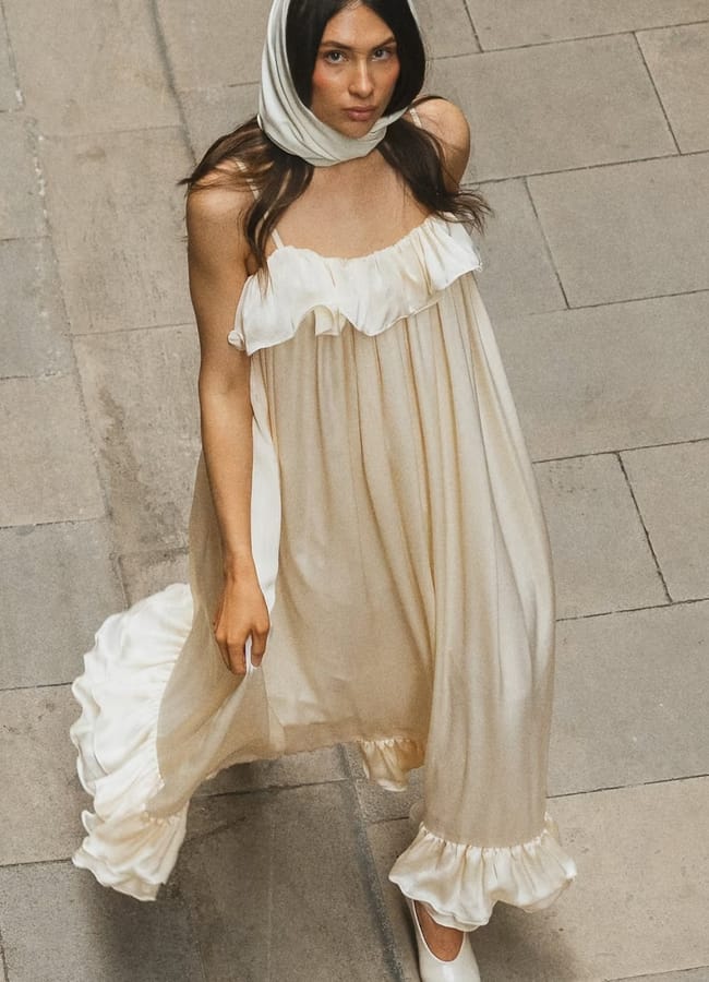 MODEL WEARING NA-KD Kate klem - ruffle volume maxi dress in cream