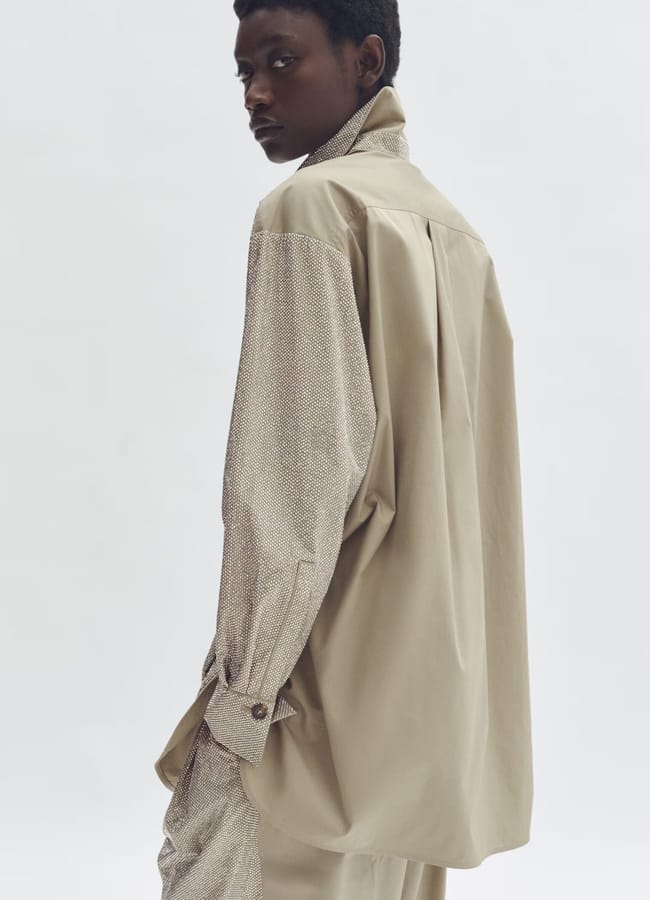 MODEL WEARING Oversized embellished shirt