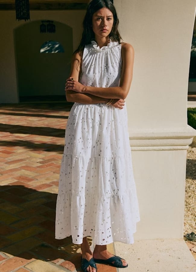 model wearing white broderie anglaise Sezane Solid Floral Embroidery Maxi Ecru