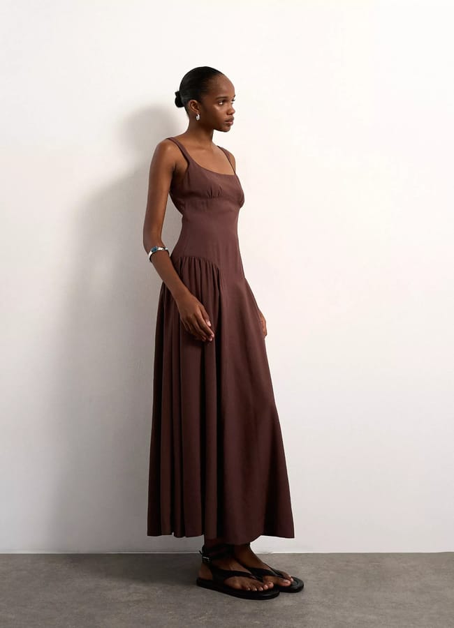 model wearing brown Topshop dropped waist maxi sundress in chocolate